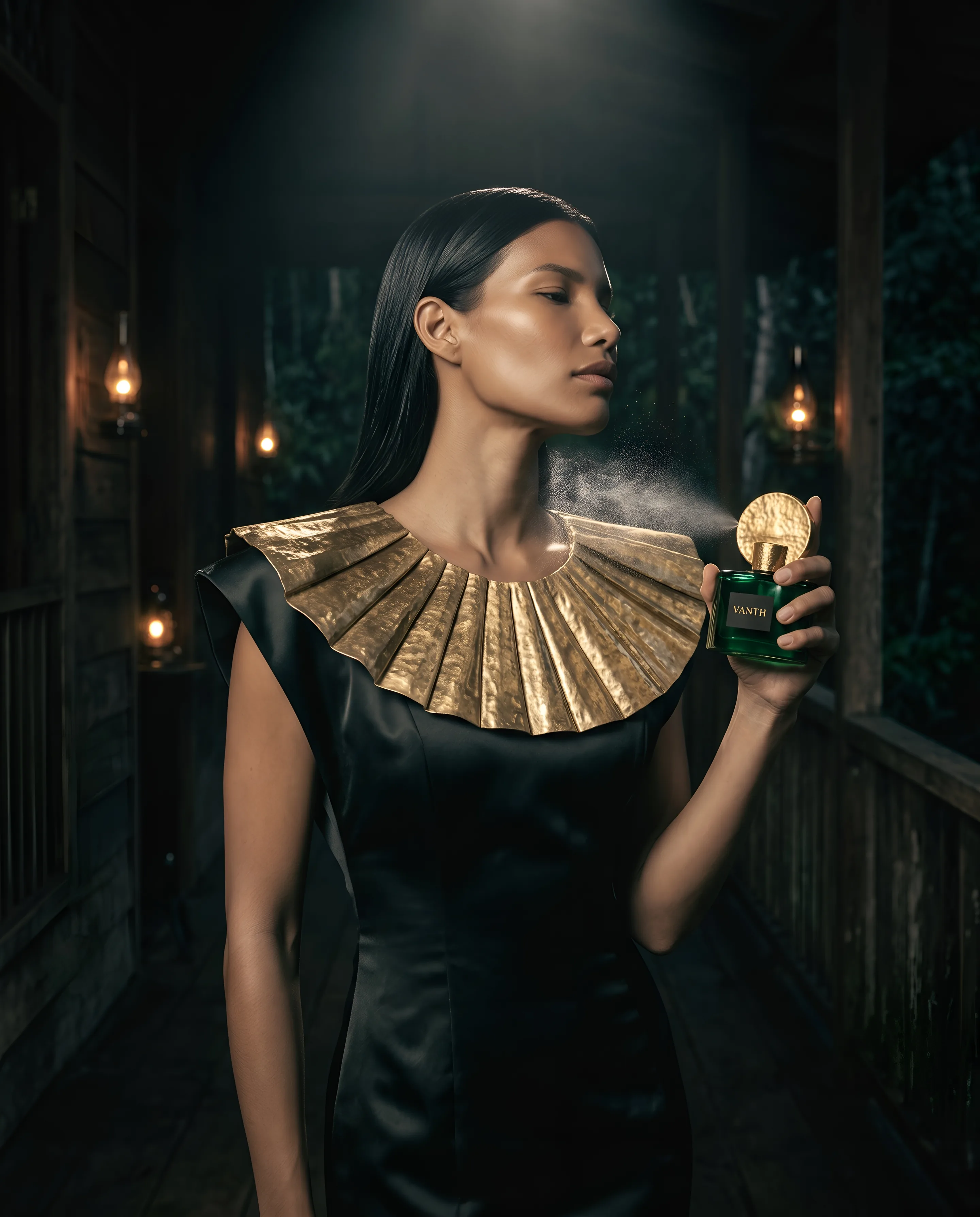A woman with long straight black hair stands on the dark veranda of a river mansion at night, in a black satin gown with a wide gold collar, holding an emerald glass bottle with a gold cap and spraying perfume on her neck