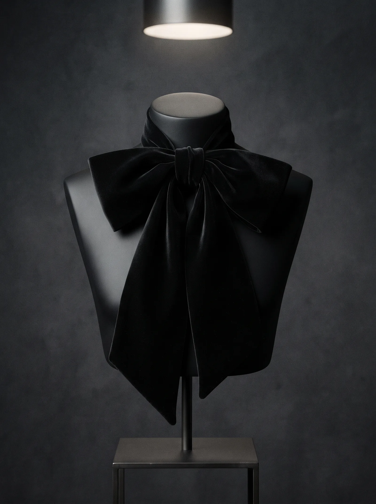 The Velvet Bow tied at the neck of a black bust: a large bow of black silk velvet with long ends