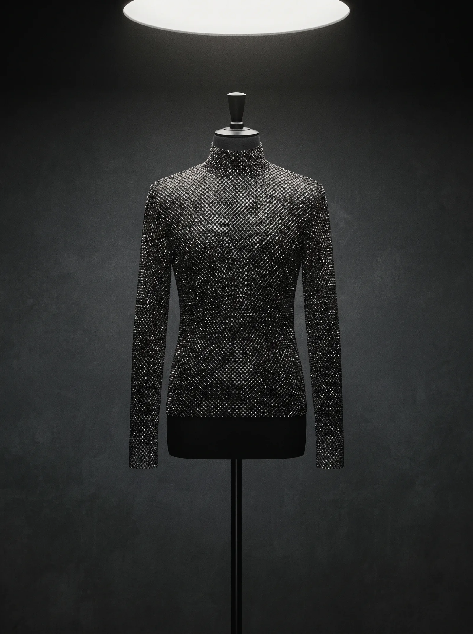 The Mesh Top on a black dress form: a long sleeved top of crystal mesh with a high neck